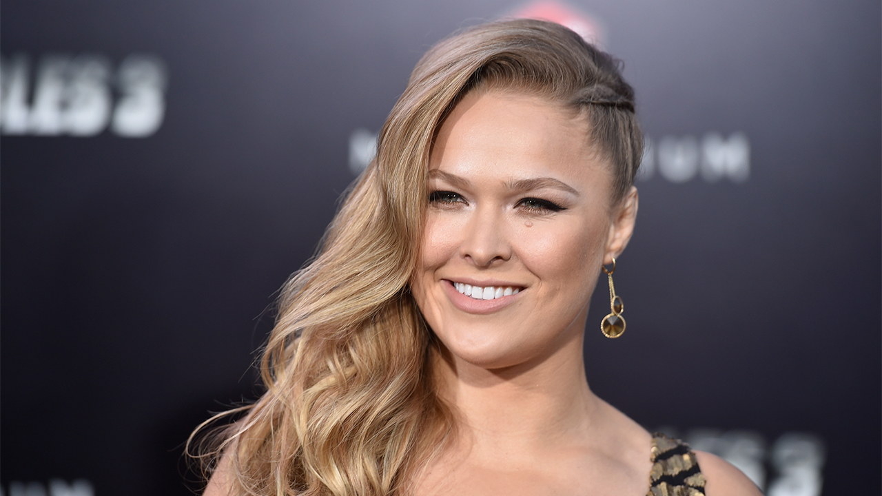 HOLLYWOOD, CA - AUGUST 11: Actress Ronda Rousey attends Lionsgate Films' "The Expendables 3" premiere at TCL Chinese Theatre on August 11, 2014 in Hollywood, California. (Photo by Frazer Harrison/Getty Images)
